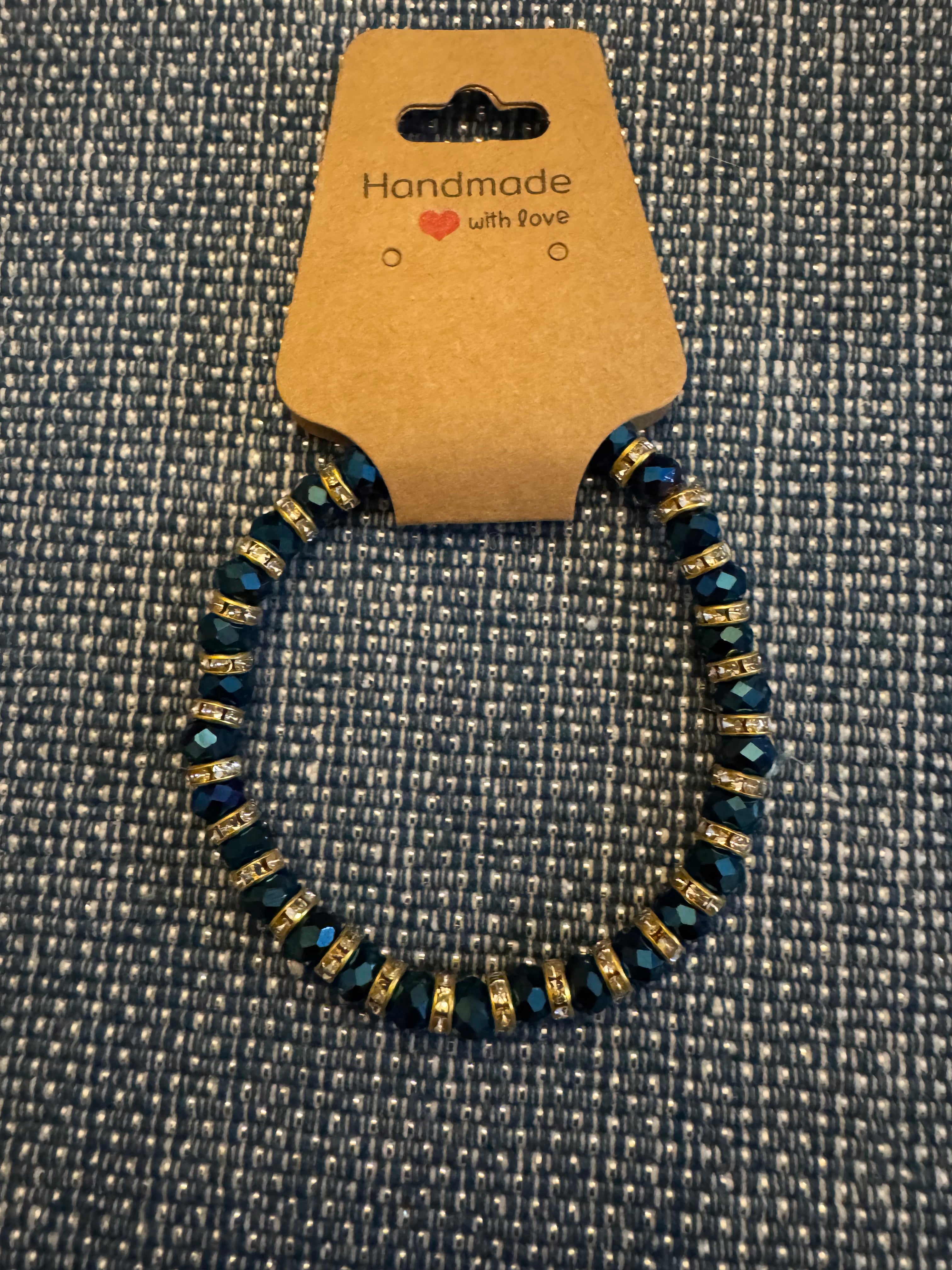 Bracelet with Peacock Blue glass beads with Gold Rhinestone Spacers